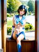 A woman in a blue and white outfit sitting on a window sill.