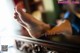 A woman's bare feet sitting on top of a table.